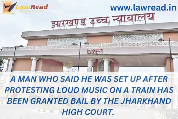 A man who said he was set up after protesting loud music on a train has been granted bail by the Jharkhand High Court.